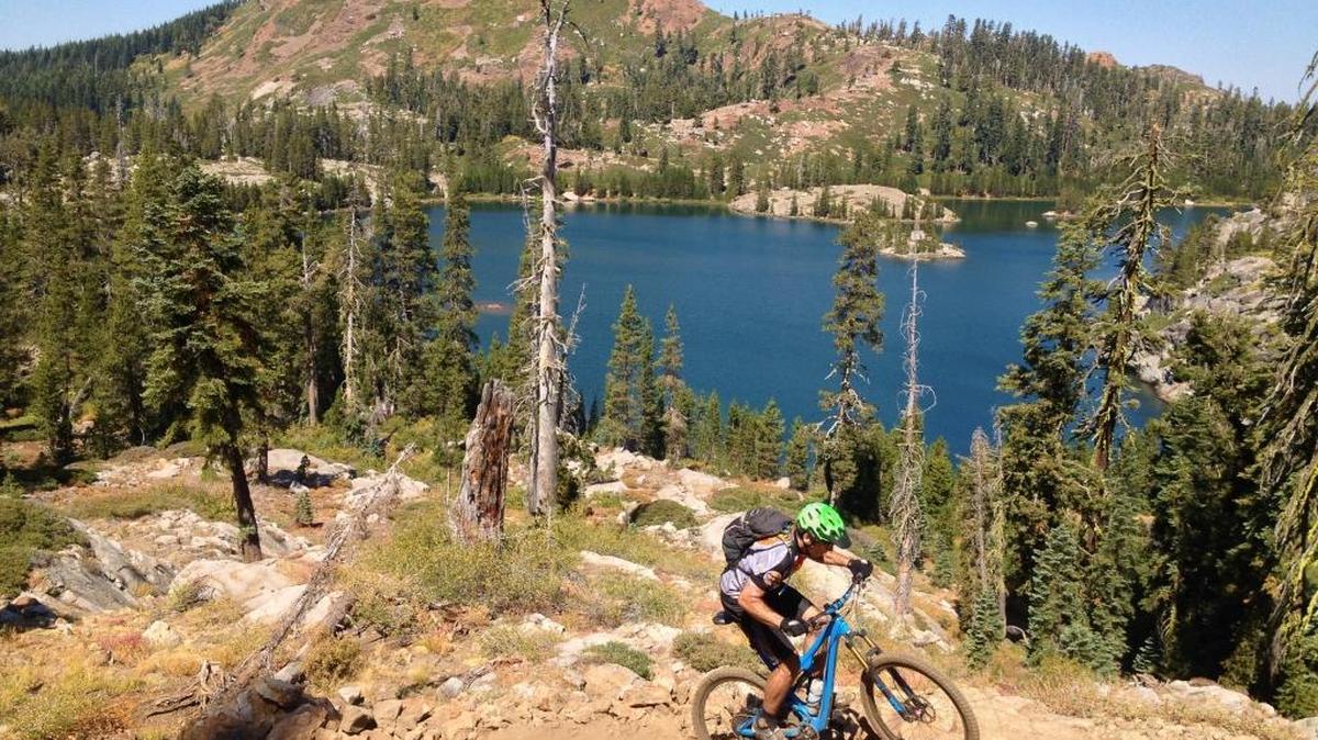 The Grouse Ridge Non-Motorized Area of Tahoe National Forest, north of I-80/Cisco Grove allows mountain biking in its rugged backcountry. If it were a designated wilderness, bicycles would not be allowed.