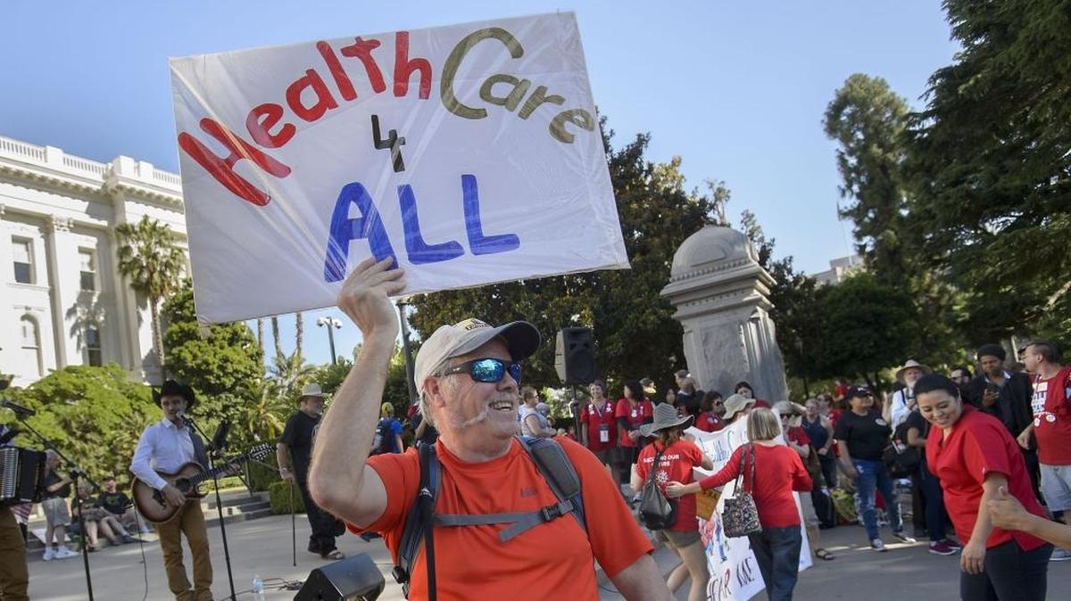 Bob Hart of Roseville demonstrates during a rally at the state Capitol in Sacramento in May 2017, in support of a Senate bill to create a universal single-payer health care system in California. The estimated cost of such a plan is $400 billion.
