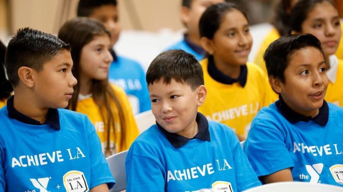 Los Angeles school children appear at a YMCA press conference announcing a partnership with Cal State LA to improve college readiness in underserved areas of Los Angeles. Photo by J. Emilio Flores/Cal State LA
