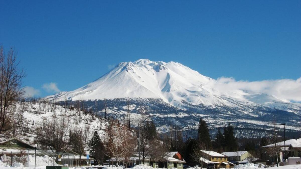 Mt. Shasta, with its springs that have proven so valuable to purveyors of bottled water, as seen from the far less water-rich Northern California community of Weed.