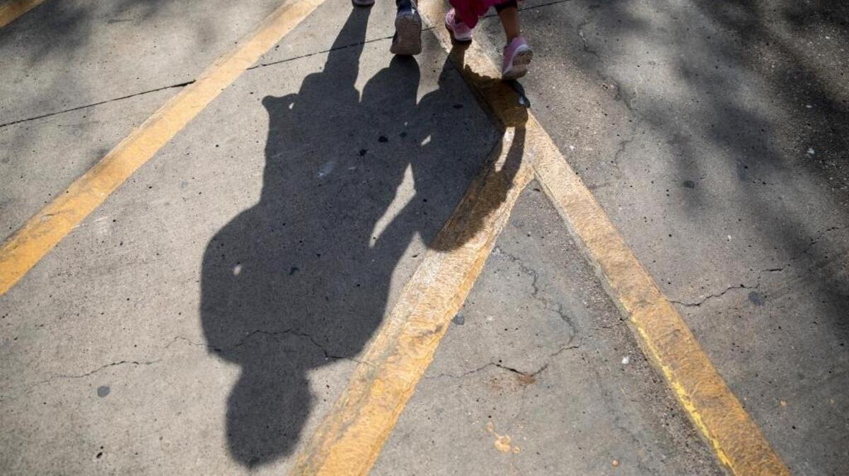 Migrant children are released from detention by immigration authorities at a bus station in McAllen, Texas, July 3, 2018, as the government struggles to reunite thousands of families separated at the border under a Trump policy.