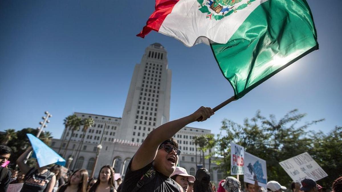 Students march on downtown Los Angeles after walking out of class on Nov. 14, demanding for local politicians to declare L.A. County a sanctuary.