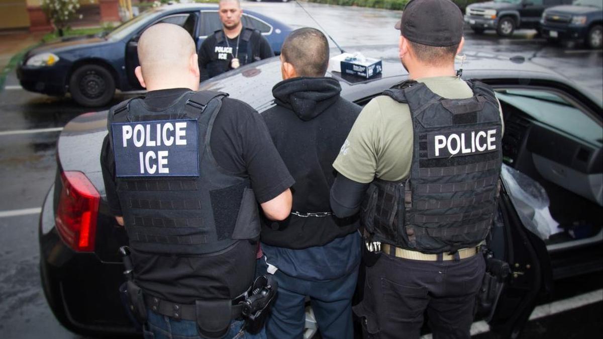 In this Feb. 7, 2017, photo released by U.S. Immigration and Customs Enforcement, foreign nationals are arrested during a targeted enforcement operation conducted by U.S. Immigration and Customs Enforcement (ICE) aimed at immigration fugitives, re-entrants and at-large criminal aliens in Los Angeles. Studies show immigrants, fearing deportation, are increasingly being targeted in courthouses and are afraid to testify in court. (Charles Reed/U.S. Immigration and Customs Enforcement via AP)