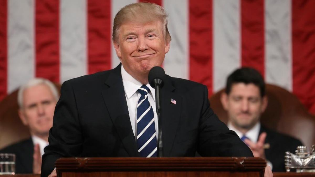 President Donald Trump addresses a joint session of Congress on Feb. 28, 2017, as Vice President Mike Pence and House Speaker Paul Ryan of Wis., listen. He’ll deliver the 2018 State of the Union address Tuesday at 6 p.m. Pacific time. (Jim Lo Scalzo/Pool Image via AP)