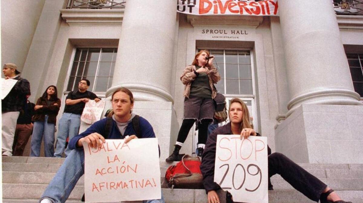 Demonstrators rally in 1997 against the anti-affirmative action measure, Prop. 209, outside Sproul Hall at UC Berkeley while protesters inside barricade themselves in the lobby. A year after the measure passed, the number of African American freshmen had fallen from 215 in 1995 to 126.
