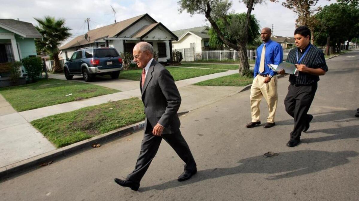 Then-Los Angeles Unified School District Supt. Ramon C. Cortines walks the neighborhood of John C. Fremont High School to locate and bring back students who had apparently dropped out in 2009.