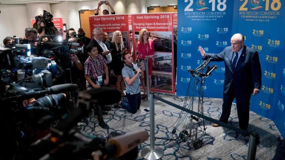 Rudy Giuliani, an attorney for President Donald Trump, speaks to reporters Saturday, May 5, 2018, in Washington. (AP Photo/Andrew Harnik)