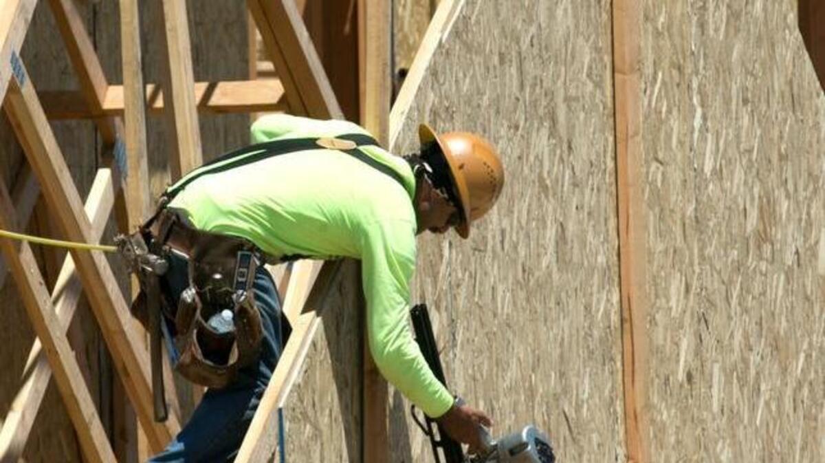 Construction workers in Sacramento work on a housing project. The California Economic Summit has targeted the housing shortage as an issue that all parties want to address.