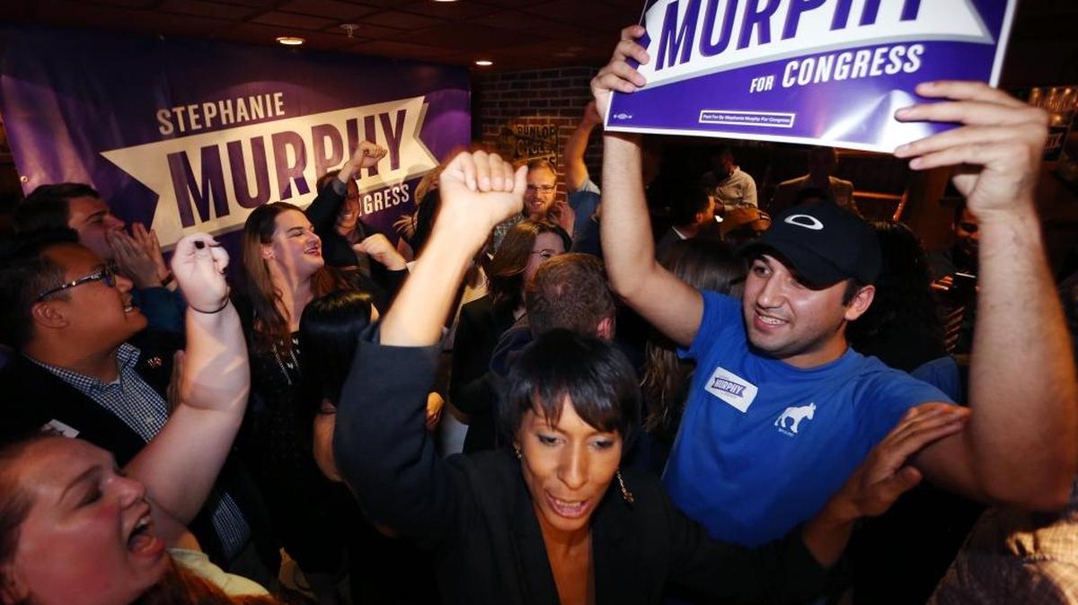 Supporters for Democrat Stephanie Murphy celebrate her victory in Maitland, Fla., on Nov. 8. Murphy defeated 12-term Republican U.S. Rep. John Mica. In January, Florida’s House delegation will include five new members whose road to victory was opened by reforming the state’s gerrymandered districts.