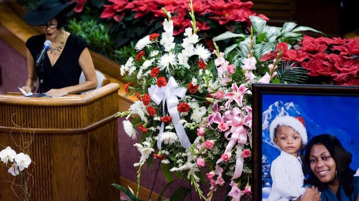 Deborah Nelson talks about her daughter, Monique Nelson, killed by stray bullets outside a south Sacramento barbershop to protect her 2-year-old son, Jayden, at St Paul Missionary Baptist Church December 23, 2010 in Sacramento. The photograph of Monique and Jayden was taken taken minutes before she was killed by a stray bullet in a strip mall parking lot.