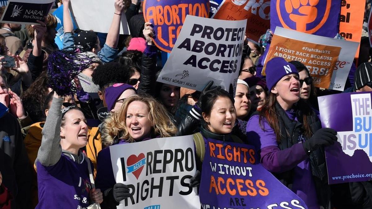 Pro-abortion rights protesters rally outside the Supreme Court last year. Many states have been considering and passing laws and regulations to make it nearly impossible for some women to freely make this most personal decision.