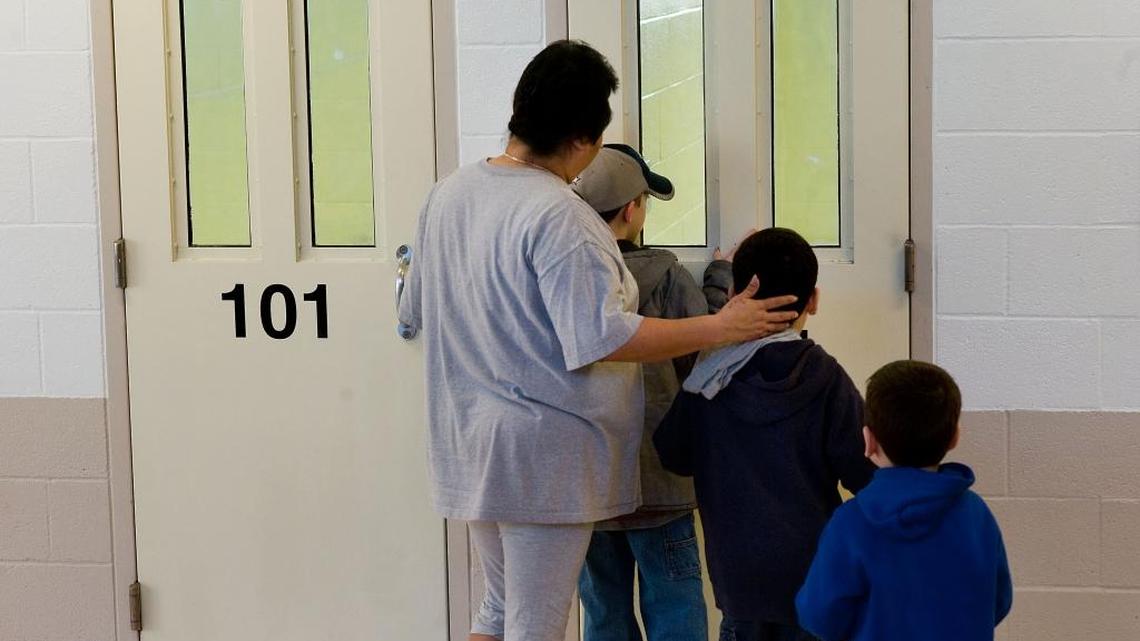 Visitors to an open house at the Sacramento County Juvenile Detention Center peer into a small room for housing wards in 2011. The county only this year ceased charging families for juvenile hall detainment, which raises little in revenue but can bankrupt poor families.