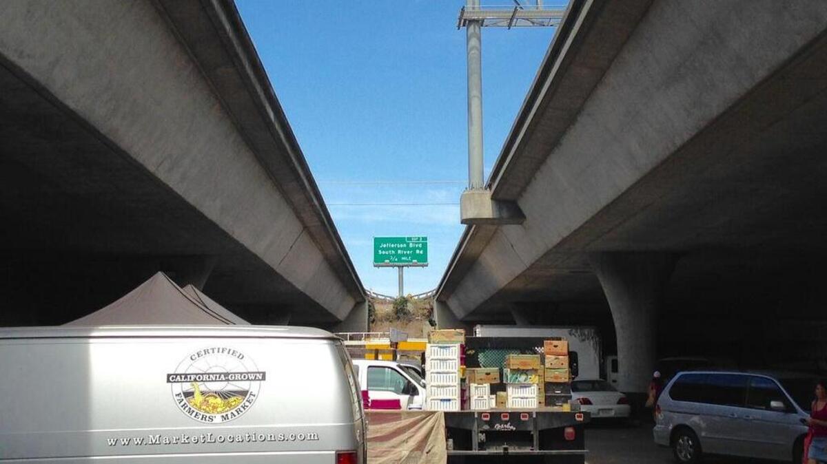 
Sacramento Central Farmers Market lies on a parking lot near Eighth and W streets, under a freeway. Our region’s freshest produce is essentially wedged between layers of cement and asphalt. 
