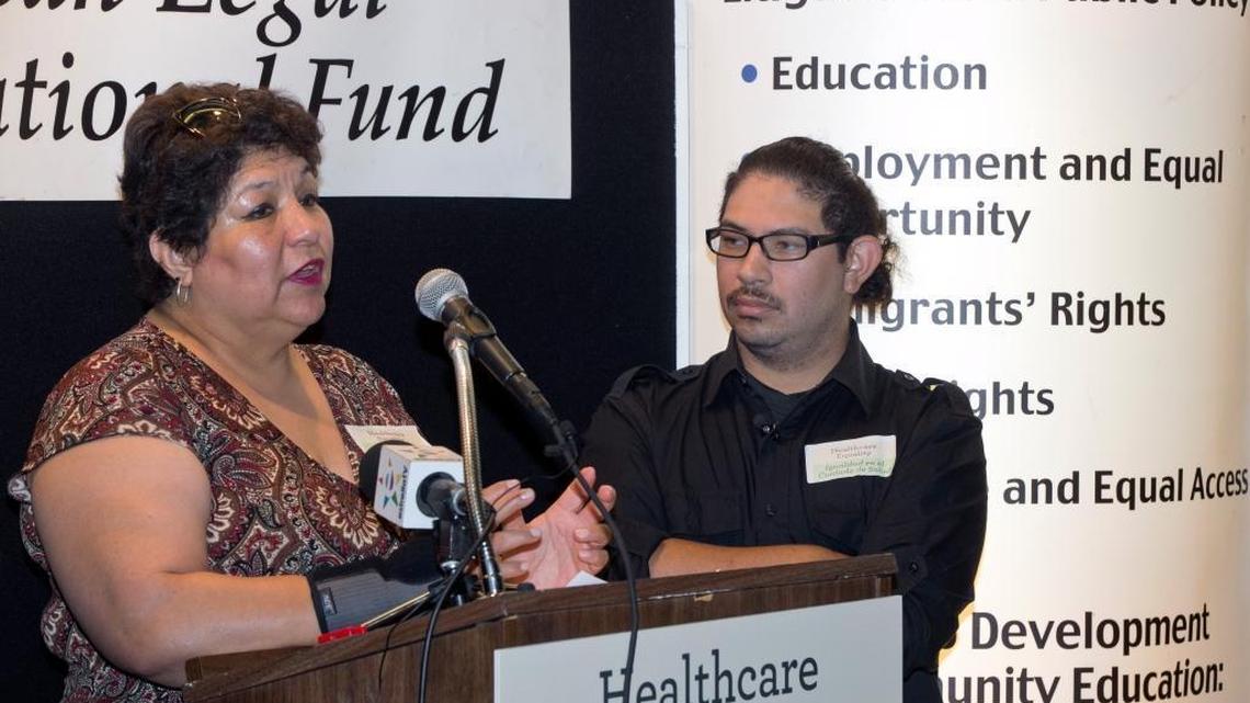 Plaintiffs Analilia Jimenez Perea and her son, Saul Jimenez Perea, speak at a news conference to announce a Medi-Cal civil rights complaint filed by attorneys with the Mexican American Legal Defense and Educational Fund, commonly known as MALDEF, and the Civil Rights Education and Enforcement Center in Los Angeles on July 12, 2017. California is harming medical care for more than 13 million lower-income residents, more than half of them Latinos, by failing to pay doctors enough to provide proper care, according to a lawsuit filed in July.