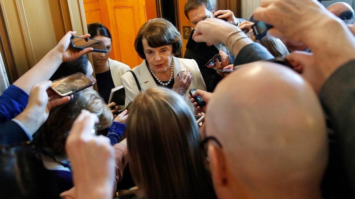 Sen. Dianne Feinstein, D-Calif., ranking member of the Senate Judiciary Committee, talks to reporters in May about President Trump's decision to fire FBI Director James Comey. Some question her decision to run for reelection in 2018. (AP Photo/Jacquelyn Martin)