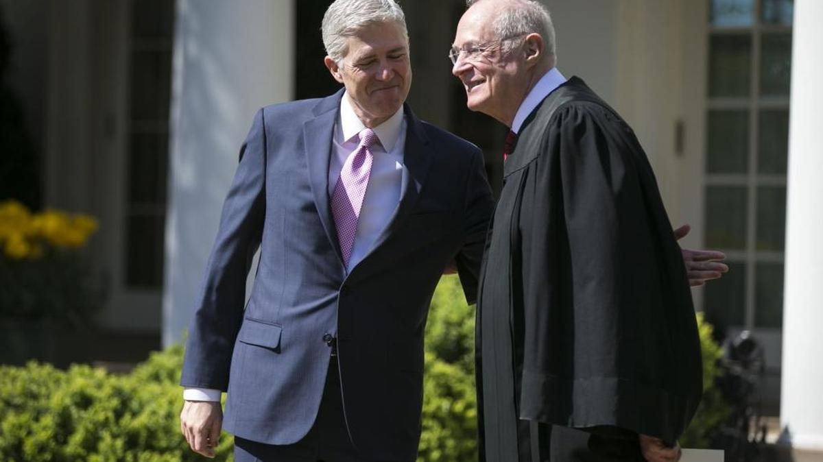 Supreme Court Justices Neil Gorsuch and Anthony Kennedy, right, at the Rose Garden of the White House in Washington, April 10, 2017. Kennedy, who has long been the decisive vote in many cases, announced his intent to retire on June 27, 2018. (Al Drago/The New York Times)