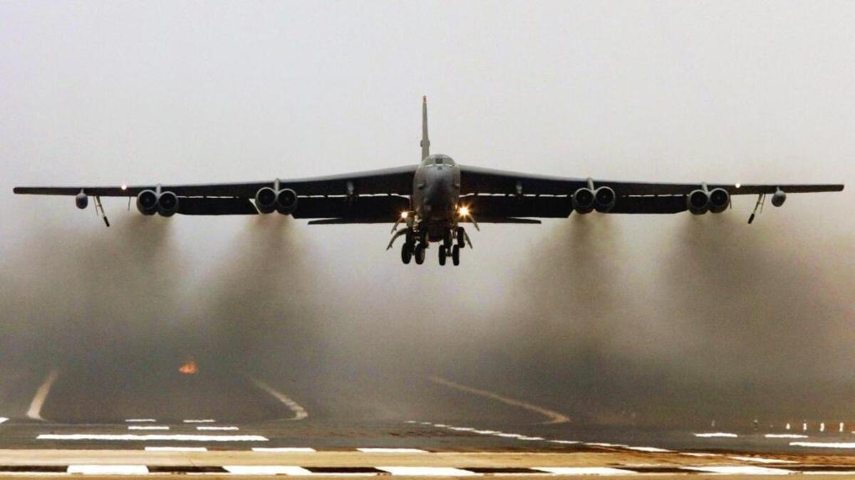 In 1962, B-52 bombers, like the one shown here in 2003, were loaded with nuclear payloads and poised to strike the Soviet Union upon the president’s command.