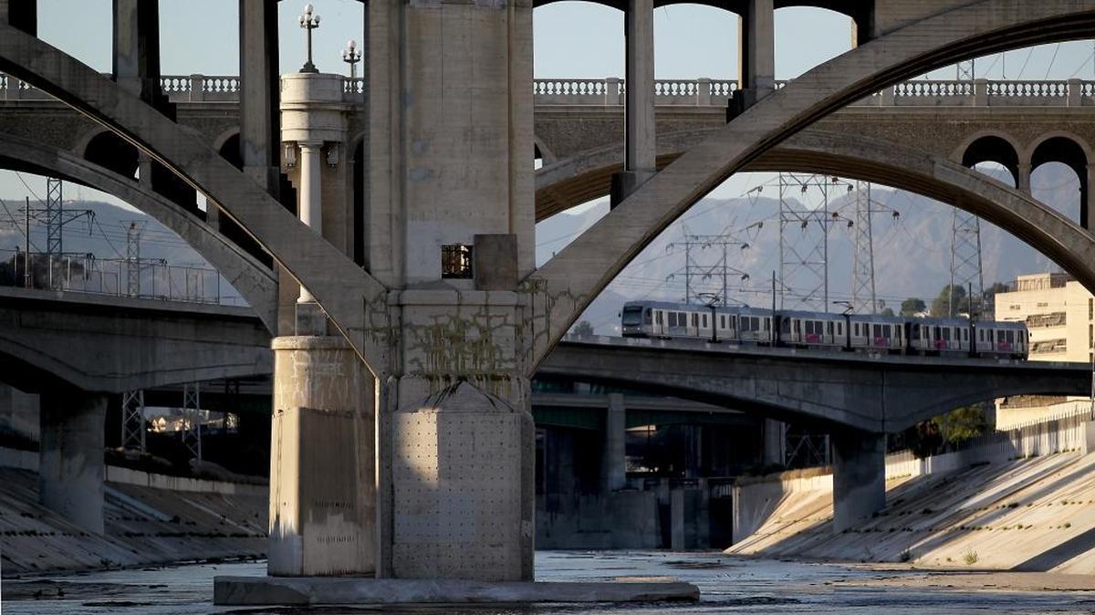 A Metro Gold Line train crosses the Los Angeles River near downtown Los Angeles in an April 2010 file photo.