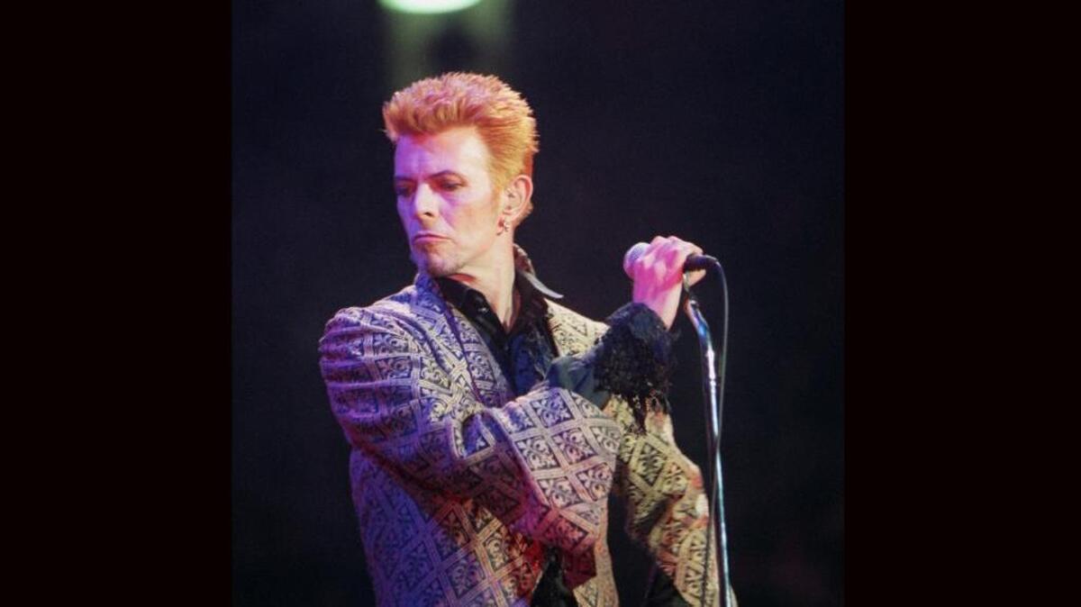 David Bowie performs during a 1997 concert at Madison Square Garden in New York celebrating his 50th birthday. Bowie, the innovative and iconic singer whose career lasted five decades, died Jan. 10.