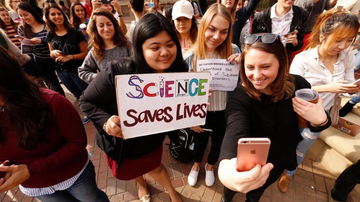 University of Southern California graduate students rally against the potential educational impact of the GOP tax cuts during a nationwide November protest. (Al Seib / Los Angeles Times/TNS)