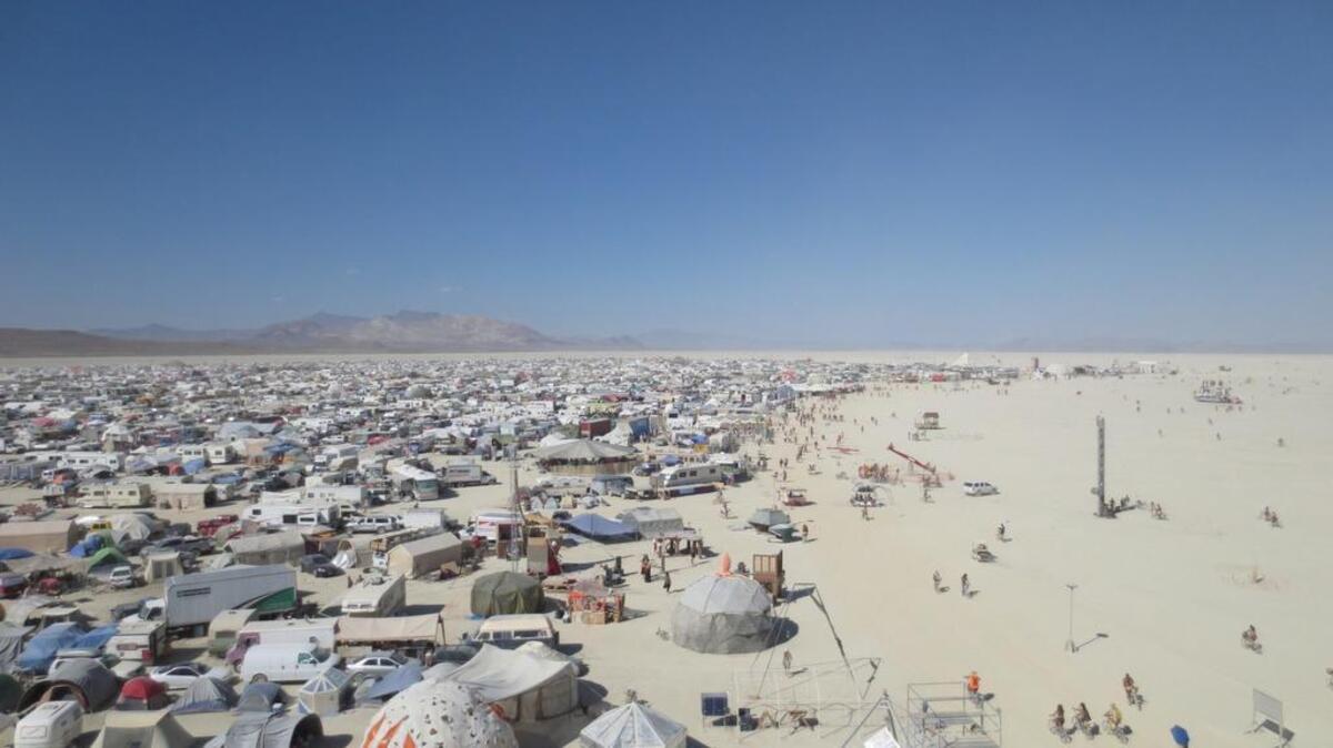
Part of Black Rock City is seen from a theme camp with a seven-story tower. About 70,000 people will create the temporary city that for 10 days will be the sixth-largest in Nevada. 
