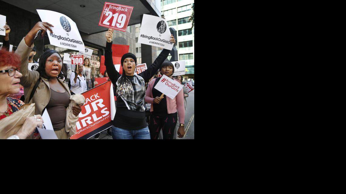 
Singer Alicia Keys, second from right, joins “Bring Back Our Girls” protesters at the Nigerian consulate in New York on Tuesday, marking the six-month anniversary of the kidnapping of Nigerian schoolgirls by Boko Haram militants.
