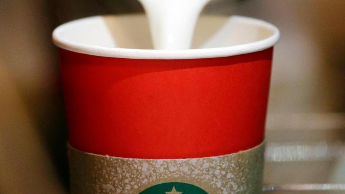 Instead of a “War on Christmas,” when Jack Ohman went to Starbucks he had a hard time finding a place to sit because Starbucks barista/elves were unpacking Christmas decorations.