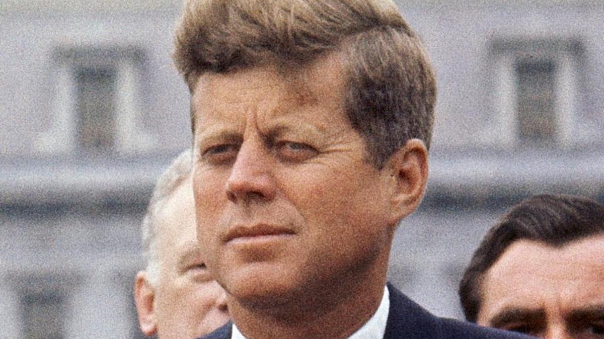 In this April 30, 1963 file photo, President John F. Kennedy listens while Grand Duchess Charlotte of Luxembourg speaks outside the White House.