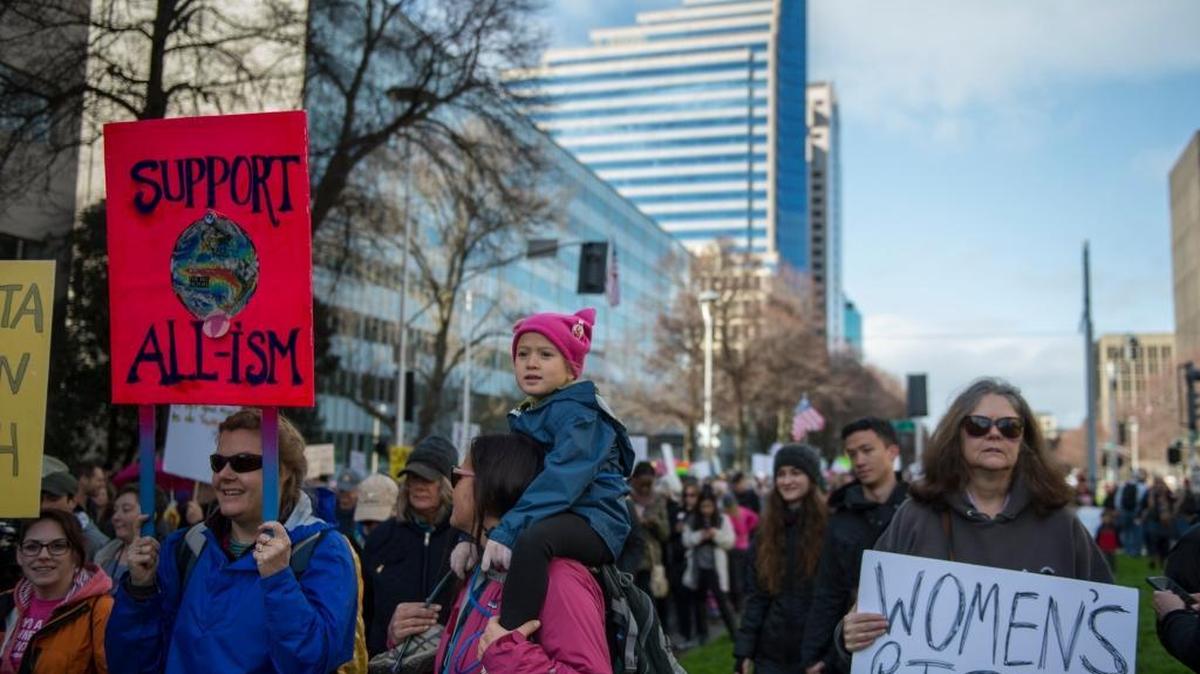 Kapu Catalfano, 5, sits on the shoulders of her mother, Miki’ala, during the Women’s March on Sacramento in January.