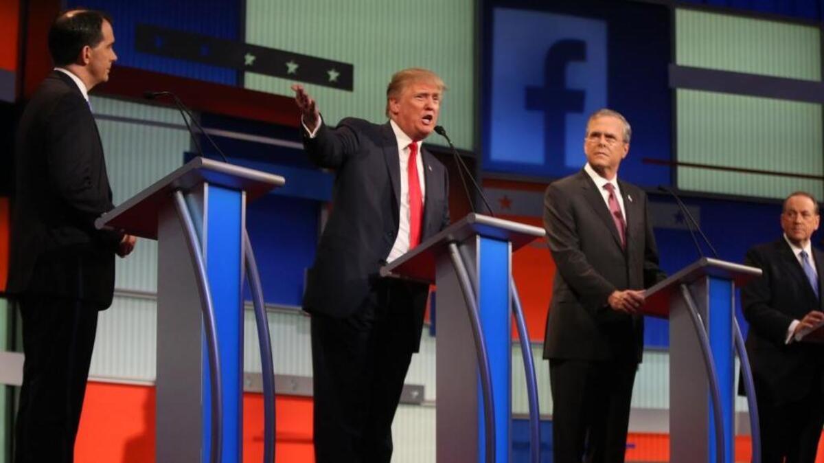 
From left, Scott Walker, Donald Trump, Jeb Bush and Mike Huckabee were on a crowded stage at the first Republican presidential debate in August. The second debate is set for Wednesday night.
