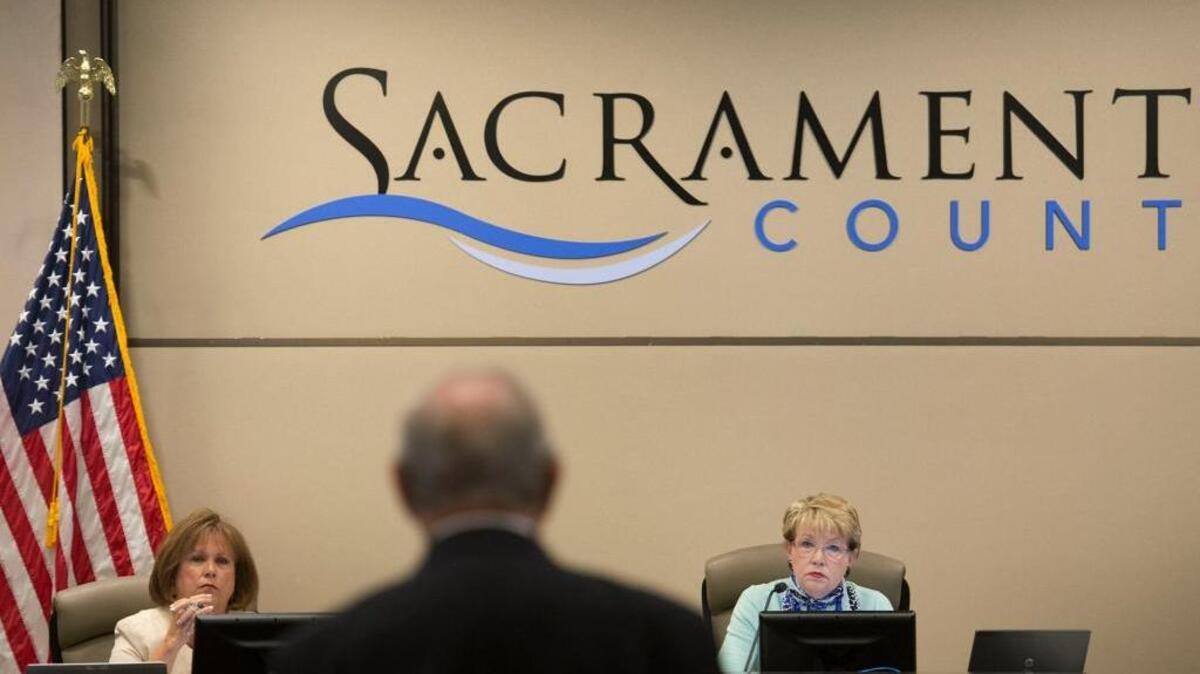 Susan Peters, left, and Roberta MacGlashan listen during a Sacramento County supervisors meeting last year. MacGlashan decided not to run for re-election and will be replaced by Sue Frost on Tuesday. Peters also gets sworn in for her fourth term on Tuesday.