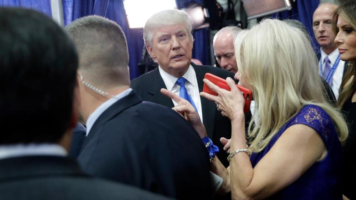 Donald Trump meets with reporters to complain about his microphone after the presidential debate with Hillary Clinton on Monday at Hofstra University.