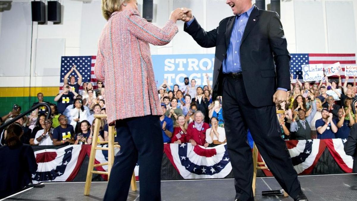 Hillary Clinton fist bumps Sen. Tim Kaine at a rally on July 14. On Friday, the Democratic presidential nominee announced Kaine as her running mate.