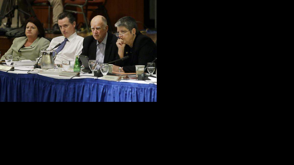 
From left, Assembly Speaker Toni Atkins, Lt. Gov. Gavin Newsom, Gov. Jerry Brown and University of California President Janet Napolitano listen to students speak during the public comments portion of the UC Regents meeting in San Francisco on Nov. 20. The University of California has approved raising tuition by as much as 5 percent in each of the next five years unless the state devotes more money to the 10-campus system. 
