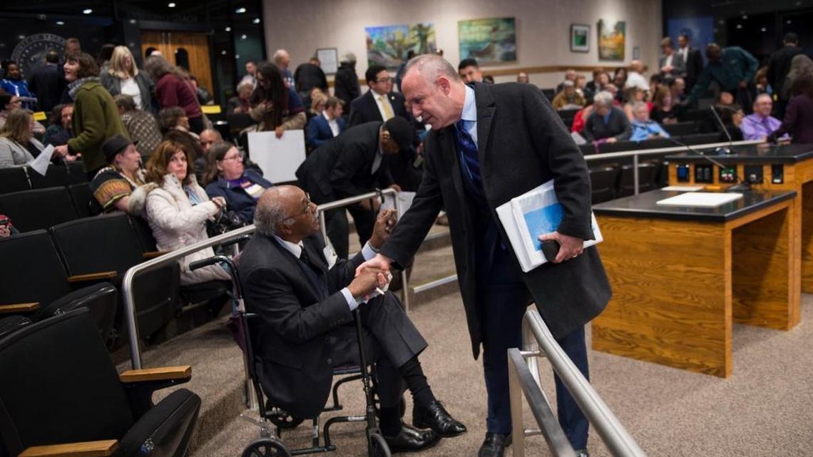 Mayor Darrell Steinberg greets Fredrick Gayle at a special joint meeting between the Sacramento City Council and Sacramento County Board of Supervisors on homelessness in January 2017. Under Steinberg’s pressure, county supervisors agreed to spend state mental health money on the homeless.
