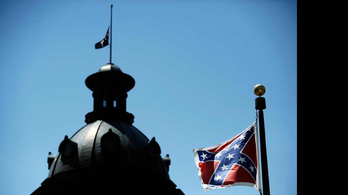 
A Confederate flag flies near the South Carolina Statehouse in Columbia, S.C., on Friday. 
