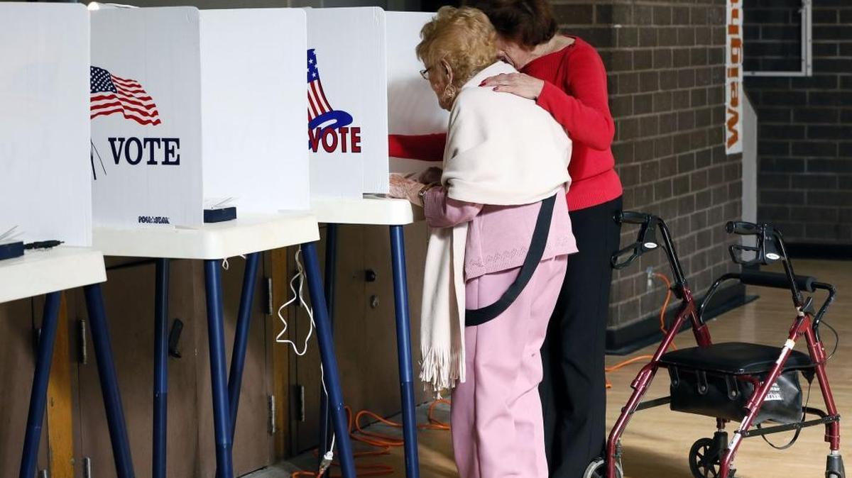 
A Los Angeles voter casts a lonely ballot last November. California’s turnout in the 2014 general election was a record low. 
