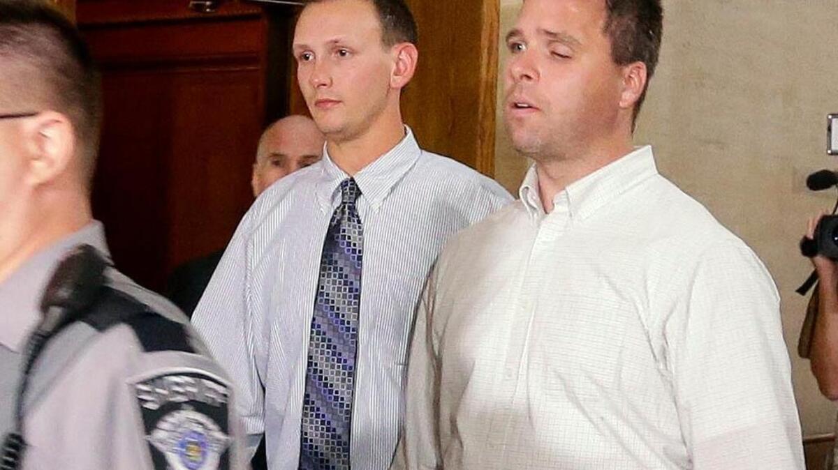 
Former Milwaukee police Officers Graham Kunisch, right, and Bryan Norberg were seriously wounded by a gun purchased in a negligent sale at a Wisconsin gun store.
