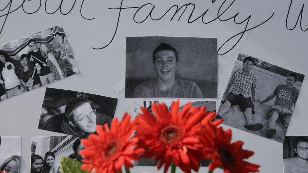 In this 2014 file photo, images of shooting victim Christopher Martinez are displayed in a memorial in Isle Vista. California lawmakers approved a law allowing for gun violence restraining orders following the attack that left six people dead.
