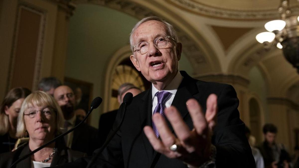 Senate Democratic Leader Harry Reid of Nevada talks to reporters Tuesday about the stalemate over $1.1 billion in Zika funding.