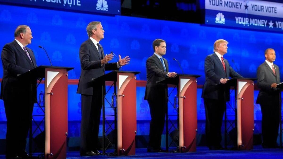Jeb Bush, second from left, is flanked by fellow candidates Mike Huckabee, Marco Rubio, Donald Trump and Ben Carson during the CNBC Republican presidential debate at the University of Colorado.