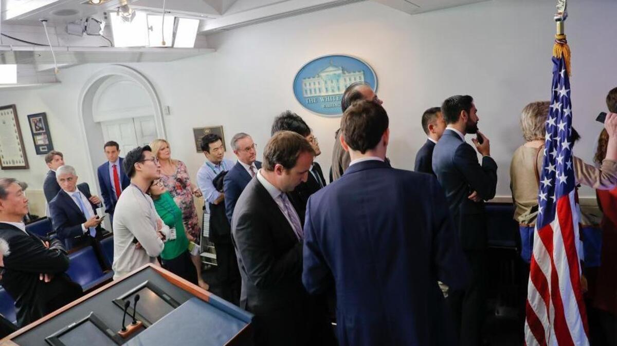 Reporters line up to attend a briefing in Press Secretary Sean Spicer’s office at the White House on Friday. Several reporters were barred, provoking a protest from media organizations.