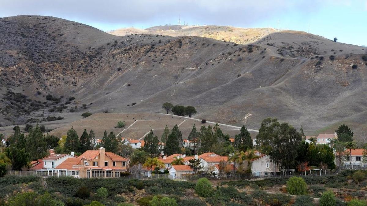 The leaking Southern California Gas Co. storage site, which has spewed a cloud of methane over Porter Ranch Estates, shown here, is one of about a dozen such underground natural gas holding areas scattered around the state.