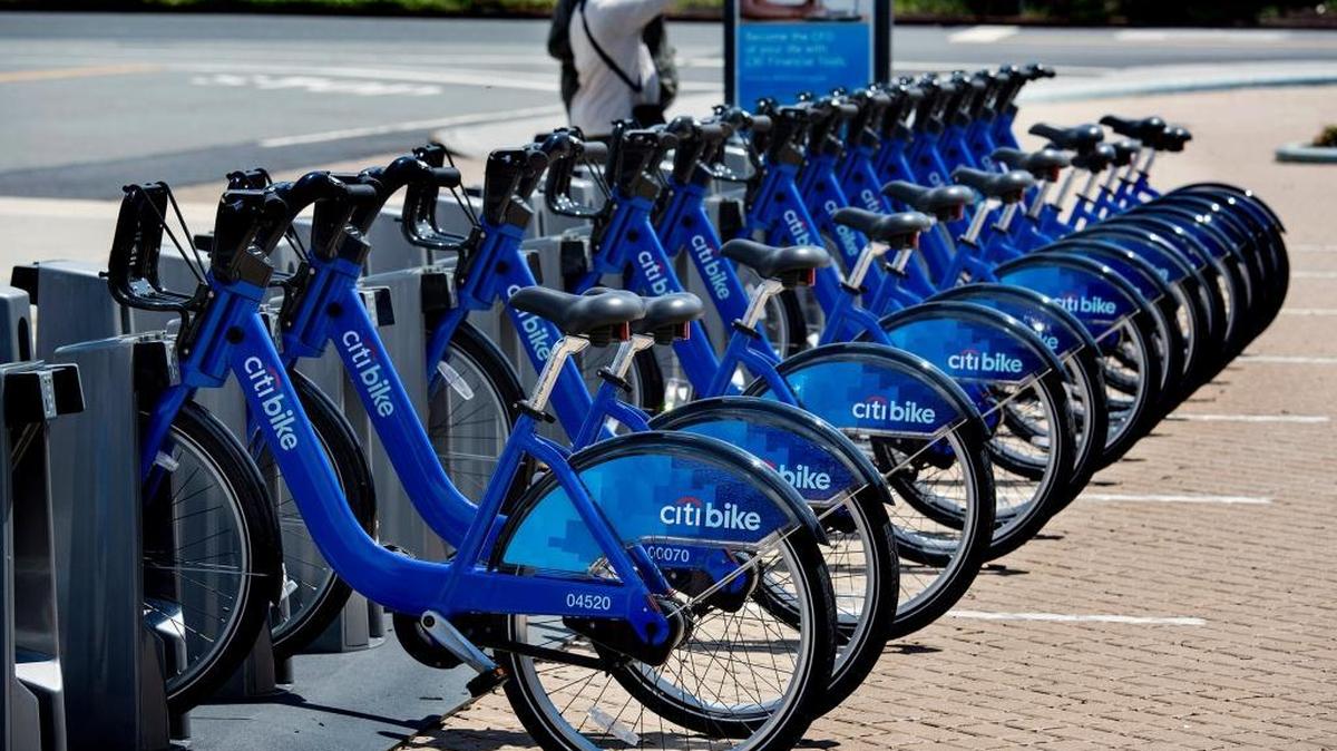 Bicycles that are part of New York City’s bike-sharing program sit parked at a dock at the Brooklyn Navy Yards in New York.