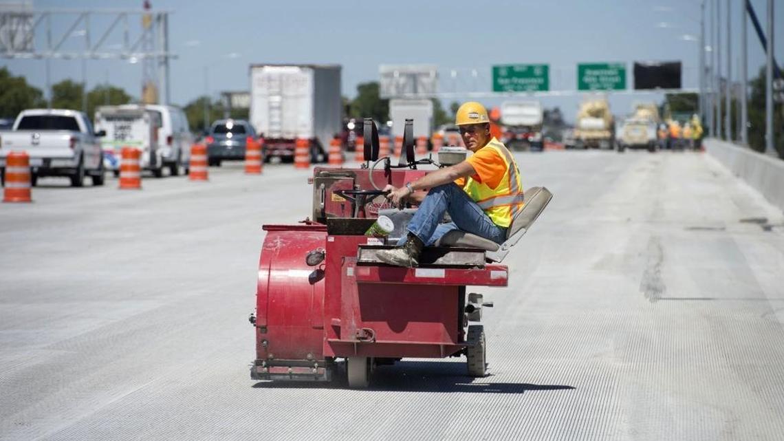 Construction crews wrap up work on the Fix50 project in Sacramento in 2014. A new transportation plan focuses on repairing existing roads and expanding public transit.