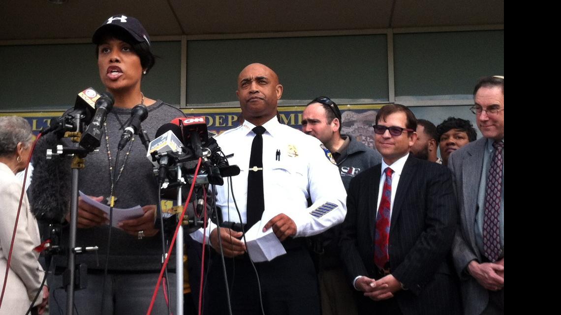 
Baltimore Mayor Stephanie Rawlings-Blake speaks as Police Commissioner Anthony Batts, center, listens at a news conference Tuesday in the aftermath of rioting following Monday’s funeral for Freddie Gray, who died in police custody. 
