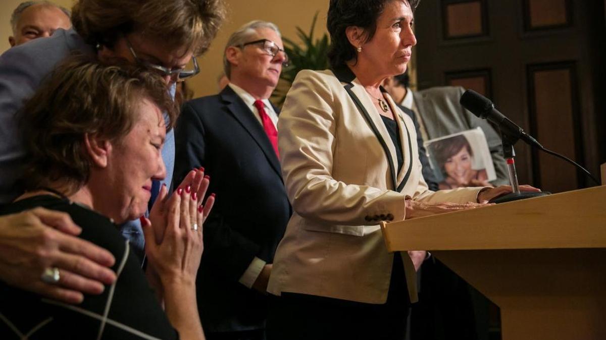 Assemblywoman Susan Talamantes Eggman, right, announces the approval of aid-in-dying legislation on Sept. 11. The pharmaceutical company that owns the most commonly used drug has doubled its price.
