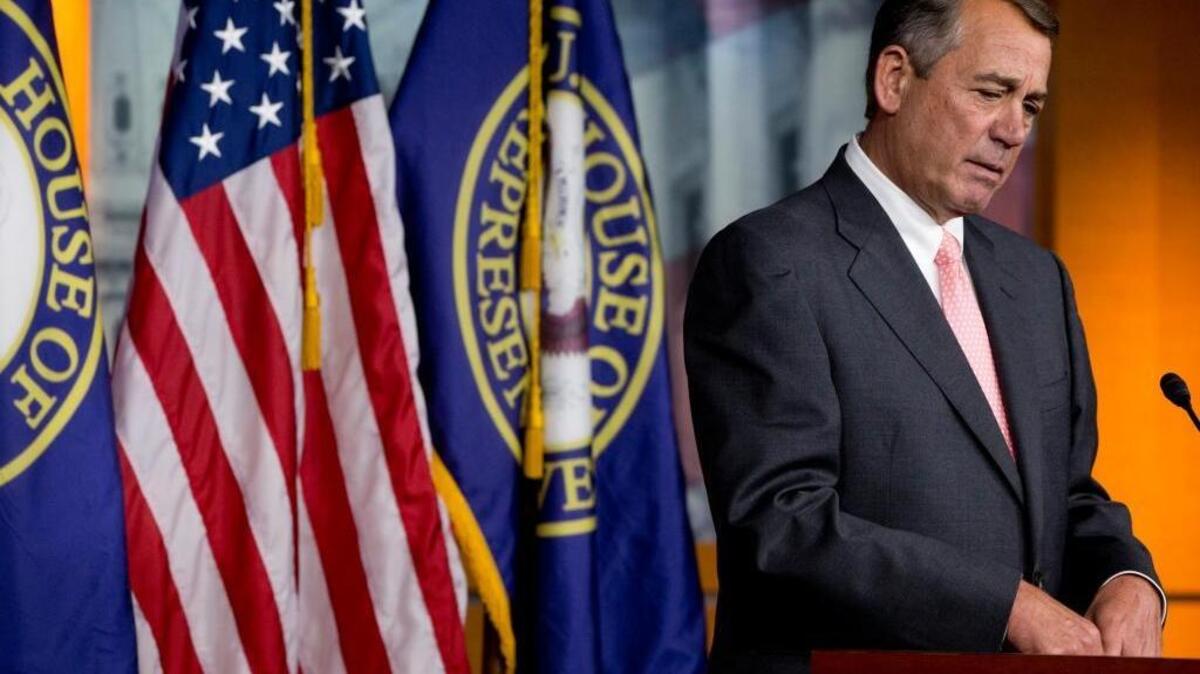 
House Speaker John Boehner of Ohio speaks during a news conference Friday. In a stunning move, Boehner announced he would resign from Congress at the end of October. 
