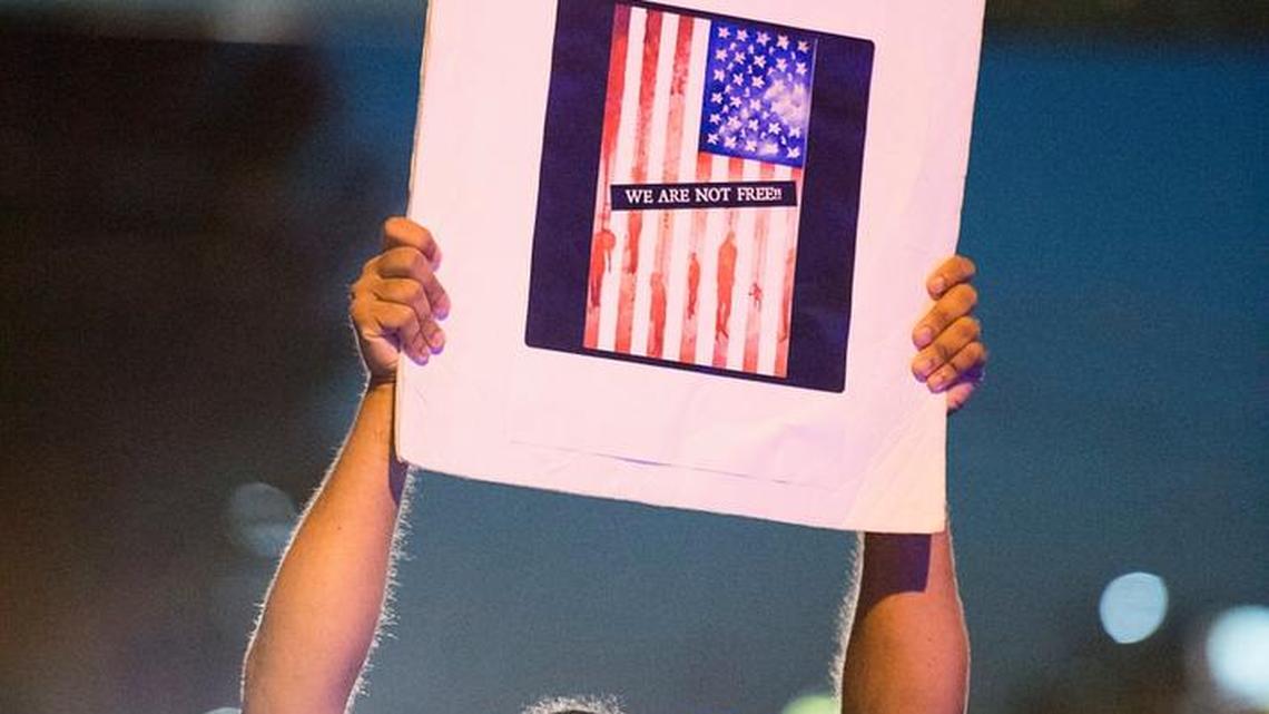 Kenyan Bliss joins a September protest of the killing of Joseph Mann by Sacramento police officers.