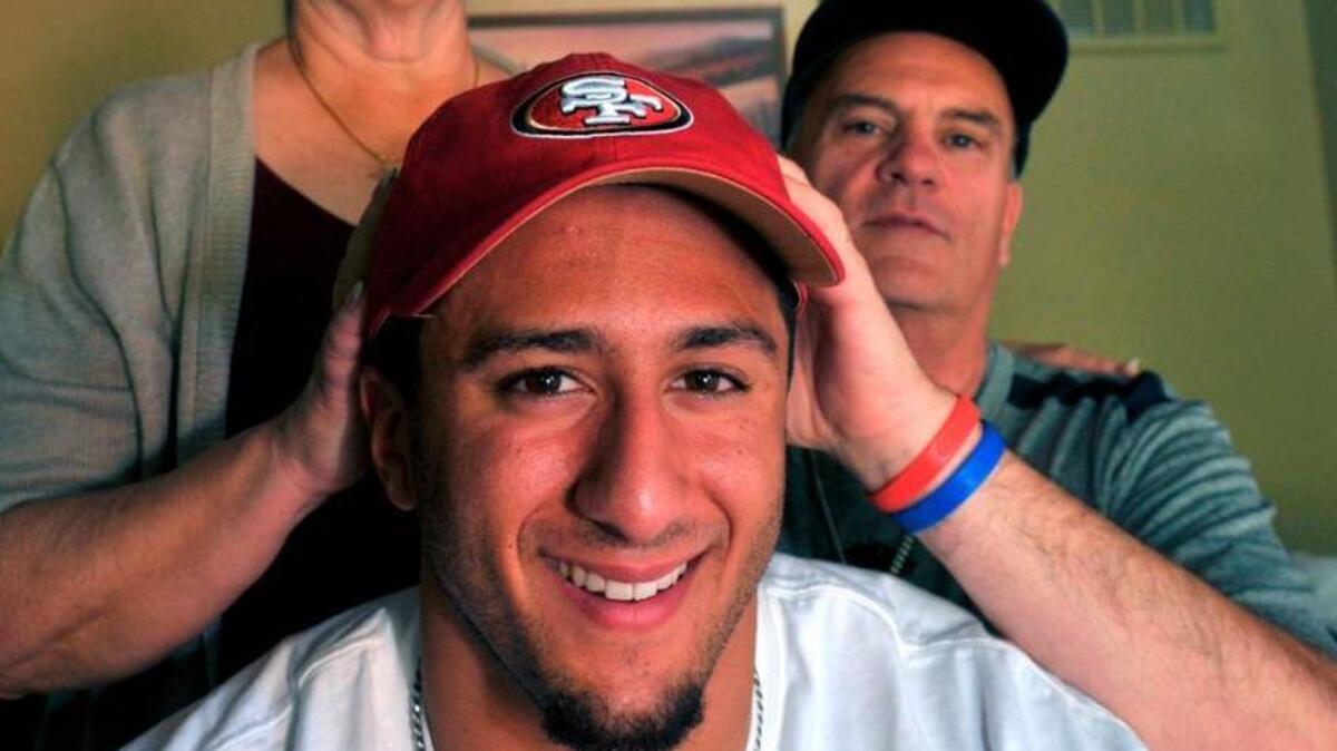 Parents Teresa and Rick with their son Colin Kaepernick at their Turlock home in 2011, after he was picked by the San Francisco 49ers in the 2nd round of the NFL Draft.
